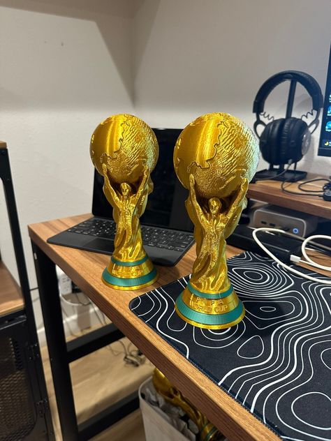 World cup trophy for soccer fans!, printed with silk gold pla+ its solid gold color! Large is: 10 Inch Tall Small is: 7 Inch Tall. Secret Santa Christmas Gifts, Messi World Cup, Soccer Trophy, England National Football Team, World Cup Trophy, Trophy Cup, Soccer Gifts, Soccer World, Elephant Decor