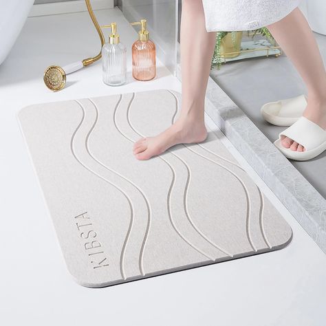 PRICES MAY VARY. Quick-Drying Stone Bath Mat: Keep your bathroom dry with our diatomaceous earth bath mat. Made from natural diatomite, it absorbs water and promotes rapid evaporation, ensuring dry and slip-free feet. Non-Slip Stability: Enjoy a secure footing on our bathroom floor mat. Its non-slip pad keeps it firmly in place, preventing slips and slides. Say goodbye to bathroom accidents! Easy Maintenance: Maintain the exceptional absorbency of this bath stone mat with our included sanding to Pretty Apartments, Stone Mat, Stone Bath Mat, Bathtub Mats, Stone Shower, Stone Bath, Bathroom Floor Mat, Apartment Life, Diatomaceous Earth