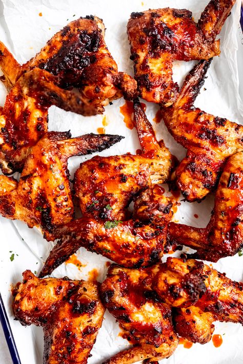 Nando's copycat peri peri chicken wings are the perfect BBQ appetizer. A simple chicken wing marinade with smoky paprika, spicy chillies and some sweet honey come together in just a few minutes. These peri peri wings get crispy skin and they can be baked or grilled! Peri Peri Wings Recipe, Peri Peri Wings, Peri Peri Chicken Wings, Peri Peri Chicken Wings Recipe, Chicken Wings Marinade, Wing Marinade, Chicken Wings Bbq, Nando's Chicken, Chicken Wing Marinade