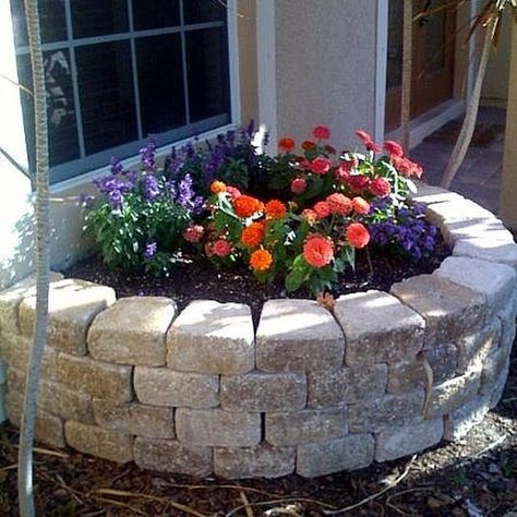 The stone paver retaining wall I built makes a perfect raised flower bed! Flower Beds Diy, Stone Flower Beds, Building A Retaining Wall, Raised Flower Beds, Meteor Garden 2018, Kew Gardens, Flower Bed, Landscaping With Rocks, Covent Garden