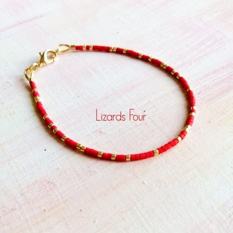 NEW!!! Red Miyuki Bracelet! LizardsFour.etsy.com We Ship worldwide!  #etsy #etsyshop #giftforher #giftforwomen #jewelryaddict #jewelryoftheday #giftideas #etsyseller #jewellery #bracelets #redjewelry #etsysellers #stylemepreety #jewelry #minimalisticbracelets #instajewelry #jewelrymaking #daintybracelets #etsyfinds #bracelet #beadedbracelets #beadesbracelet #madeingreece #smallshop #fashionjewelry #smallbusiness #onsale #prosfores #instafashion #redbracelets Minimalistic Bracelet, Simple Beaded Bracelets, Small Bead Bracelet, Spiral Jewelry, Miyuki Bead, Gold Beaded Bracelet, Red Beaded Bracelet, Plain Red, Bracelet Miyuki