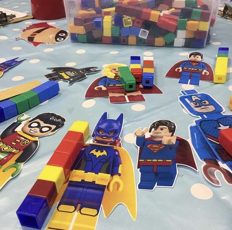 Measuring superhero’s with cubes! #eyfs #eyfsmaths #superheros #earlyyearsideas Superhero Nursery Activities, Superhero Provision Eyfs, Real Life Superheroes Eyfs, Superhero Provocation, Superhero Maths Activities Eyfs, Superhero Kindergarten Activities, Superhero Reception Ideas, Superhero Continuous Provision, Shape Space And Measure Eyfs Activities