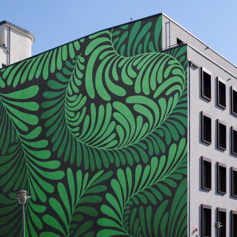 Transform your urban space into a verdant oasis with a striking botanical plant mural that breathes life into the concrete jungle. This large-scale artwork covers the side of a building with lush, detailed depictions of diverse flora, creating an immersive visual experience that captivates and inspires. Ideal for community spaces, commercial districts, or anyone looking to introduce a touch of nature into urban environments, this mural beautifies & promotes a connection with the natural world. Fern Mural Painting, Botanical Mural Painting, Fern Mural, Mural Plants, Outdoor Mural Ideas, Concrete Wall Mural, Plant Mural, Building Mural, Green Mural