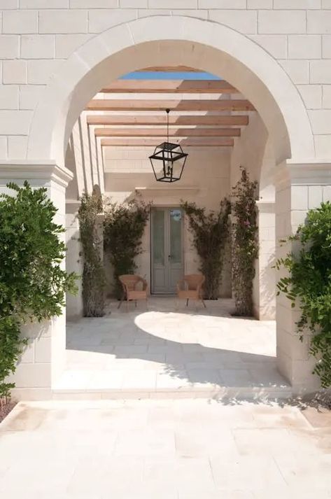 Entrance archway. #Entrance #archway #exterior #minimalism #design #monochrome #masseria #lamia #lighting #puglia #lifestyle #architecture #planting Minimalism Design, Stone Work, Cornice, Puglia, Planting, Entrance, Patio, Exterior, Interior Design