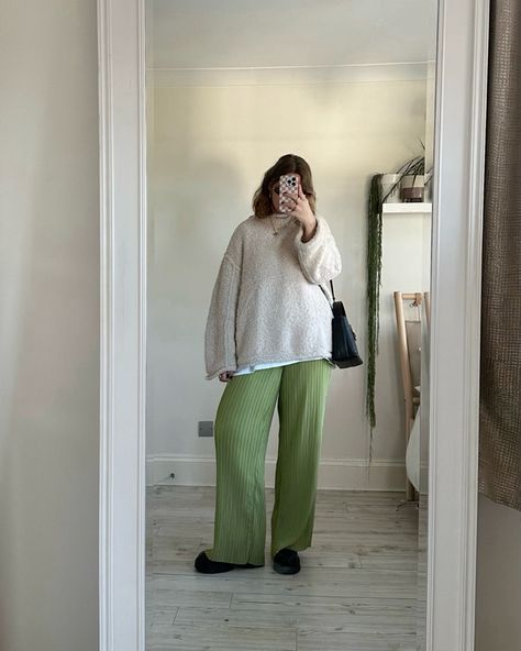 Funky pants winter outfit featuring green plisse pants, oversized white tshirt, reverse knit beige jumper, black chunky boots and black crossbody bag Follow my shop @madisoneley on the @shop.LTK app to shop this post and get my exclusive app-only content! #liketkit #LTKstyletip #LTKmidsize @shop.ltk Green Plisse Pants Outfit, Wide Leg Knit Pants Outfit, Beige Jumper Outfit, Plisse Pants Outfit, Oversized Jumper Outfit, Cream Trousers Outfit, Pants Winter Outfit, Knit Pants Outfit, Plisse Pants