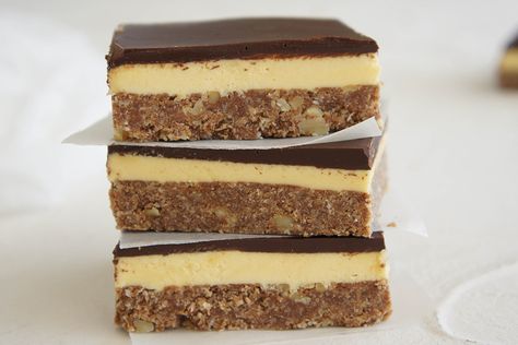 Midnight munchies? How about this moreish continental slice?! Nanaimo Bars Recipe, Nanaimo Bar, Nanaimo Bar Recipe, No Bake Slices, Bakery Treats, Nanaimo Bars, Custard Powder, Coconut Custard, Chocolate Squares