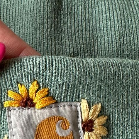 Diy Clothing Embroidery Courses | Hand Embroidery Kits on Instagram: "Comment SUNFLOWER and I’ll send you the link to this Carhartt beanie pattern. Hand embroidery makes a great hobby for busy mamas. Let’s make 2024 the year you commit to have some me time. The year you learn a new skill. The year you find something you love to do, for YOU. *not affiliated with Carhartt" Carhartt Embroidery Diy, Carhartt Hat Embroidery Diy, Carhartt Beanie Embroidery Flowers, Embroidered Carhartt Beanie Diy, Manly Embroidery, Carhartt Beanie Embroidery, Carhartt Embroidery, Sunflower Hand Embroidery, Embroidered Carhartt Beanie