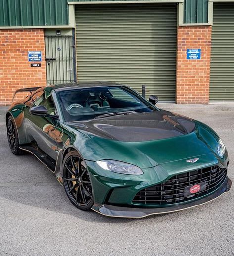 Valkyrie Registry on Instagram: "V12 Vantage with VIN ending N07233 (Edition Number 215/333) finished in Buckinghamshire Green RG1115BM with Pearl Bronze graphics. Highly optioned, it sports the optional carbon roof and bonnet. The smoked tail lights and 21” lightweight wheels in Satin Black are also there. Furthermore, the cabin is lined with Onyx Black and Forest Green Semi Aniline with a subtle contrast of Copper Tan stitching. This car was delivered in late August to @astonmartin_leeds a Forest Green Car, Green Manifestation, V12 Vantage, French Images, Gear Head, The Cabin, Tail Lights, Leeds, Tail Light