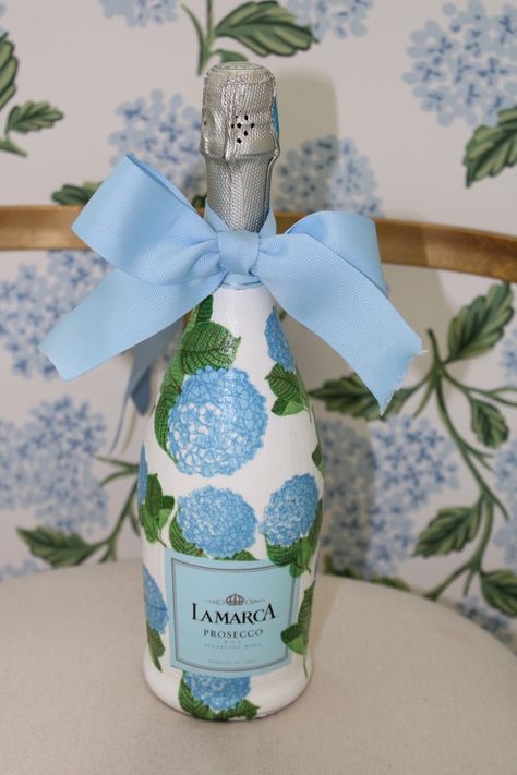 Mod Lodge Champagne Bottle, Hydrangea Painted Wine Glasses, Painted Champagne Bottle Hydrangea, Hydrangea Champagne Bottle, Blue Painted Champagne Bottle, Mod Podge Champagne Bottle With Napkins, Bachelorette Champagne Bottles, Flower Painted Champagne Bottle, Diy Champagne Bottle Decorations