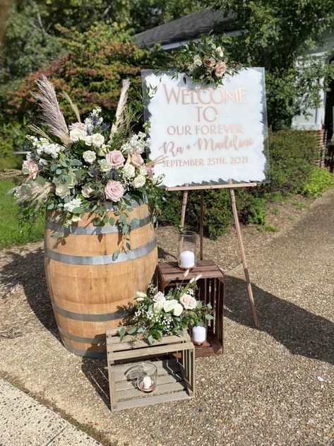 Wine Barrel Wedding Eucalyptus, Barrel Decorations Wedding, Flowers On Whiskey Barrel Wedding, Floral Arrangements On Barrels, Wedding Welcome Sign Wine Barrel, Wooden Barrels Wedding, Barrel Wedding Decor Entrance, Crate Flower Arrangements, Whiskey Barrel Wedding Decor Entrance