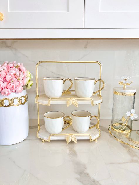 - Dimension: 13" W, 16" Total Height, 6.5" D, 6.5" H between shelves- Material: Marble with gold leaf edge. - Marble shelves are removable- Mugs are sold separately Marble And Gold Decor, Glam Coffee Bar, Glam Livingroom, Marble Shelves, Farah Merhi, Coffee Diy, Coffee Bar Station, Marble Shelf, Girly Apartments