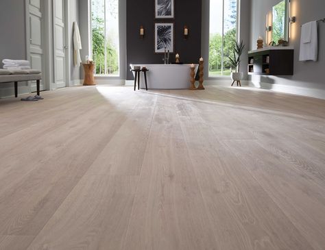 Chateau Leon, French Smoke Oak, Laminated%20Wood | Karastan Miranda House, Modern Wood Floors, Laminate Wood Flooring, Waterproof Wood, Coastal Dining Room, Coastal Dining, Oak Laminate Flooring, How To Waterproof Wood, Oak Wood Floors