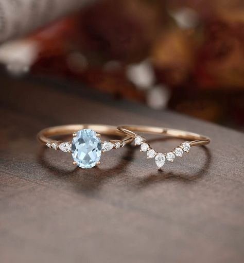 "1.8ct vintage aquamarine engagement ring set rose gold ring set women custom jewelry March birthstone ring moissanite ring set We are Manufacturer and Exporter of all type of Silver and Gold Jewelry---------- ** We Offer CUSTOM MADE SERVICES and WHOLESALE DISCOUNTS on LARGE QUANTITY PURCHASE. 》DIMENSIONS《 ❥ All Pieces Have 925 Stamp/14k/18k ❥ Main Gemstone :- Aquamarine ❥ Shape :-Oval ❥ Size :- 7X9 MM ❥ Material :- Sterling Silver/14k/18k White/Yellow/Rose Gold) ❥ Purity :- 925/14k/18k  ❥ Finis Moissanite Engagement Ring Simple, Rose Gold Aquamarine Ring, Aquamarine Wedding Ring Set, Engagement Rings Aquamarine, Aquamarine Birthstone Ring, Aquamarine Wedding Ring, Aquamarine Ring Vintage, Rose Gold Ring Set, Aquamarine Birthstone