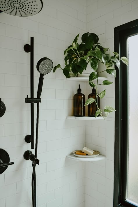 white subway tile bathroom, picture ledge bathroom, free standing tub, american standard cadet tub, matte black bathroom hardware, eclectic bathroom, diy bathroom remodel, wooden bathroom vanity, bathroom remodel, white bathroom, white subway tile wall, white free standing tub, bathroom plants, behr polar bear paint, modern block prints, hexagon tiles, cement tiles, modern farmhouse vanity, bathroom shelf styling Modern Eclectic Bathroom, White Subway Tile Bathroom, Black Bathroom Hardware, Wooden Bathroom Vanity, Matte Black Bathroom, Eclectic Bathroom, Decor Studio, Modern Eclectic, Diy Bathroom Remodel