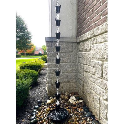 Rain chains look great work great and sound great! No more boring downspouts! Install one of these at your front porch or backyard for added curb appeal. This rain chain features farmhouse bucket cups, powder coated, heavy duty iron and detailed craftsmanship. It comes assembled and measures 8.5 ft long. It is sufficient for most home gutter systems. Additional links or cups are available at U-nitt. A gutter clip is included for easy do-it-yourself installation. Gracie Oaks Color: Black | Gracie Copper Rain Chain, Downspout Drainage, Copper Rain Chains, Rain Sound, Outdoor Fencing, Rain Chains, Outdoor Thermometer, Rain Chain, Outdoor Holidays