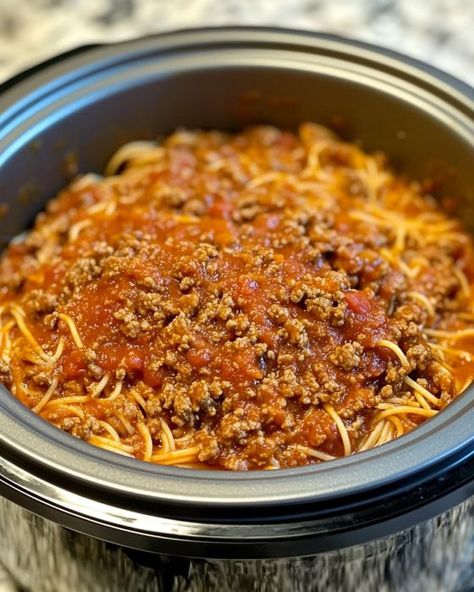 This is my signature dish for church suppers, and my friends at church absolutely rave about it Church Supper Spaghetti, Slow Cooker Church Supper Spaghetti, Crockpot Casseroles Potlucks, Hamburger Noodle Soup Ground Beef, Crockpot Casseroles, Italian Crockpot Recipes, Spaghetti Dishes, Church Recipes, Cooktop Cove