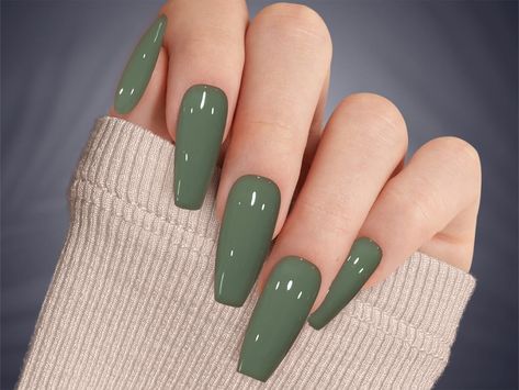 Elevate your nails with our sophisticated Hunter Sage Green Press on Nails! Crafted with meticulous attention to detail, these custom hand-painted nails feature a rich and elegant sage green hue, perfect for adding a touch of luxury to any look. 💅 See More Earth Tone Colors here: 💅 https://www.etsy.com/shop/DawnElleDesigns?ref=search_shop_redirect§ion_id=49919681  See All the Nail Designs  dawnelledesigns.etsy.comYou will receive a full set of 10 nails in your size along with a complimentary g Matte Olive Nails, Sage Green Stiletto Nails, Sage Colored Nails, Green Nails Coffin Shape, Muted Green Nails, Sage Green Ombre Nails, Sage Color Nails, Autumn Nails Green, Jade Green Nails Acrylic