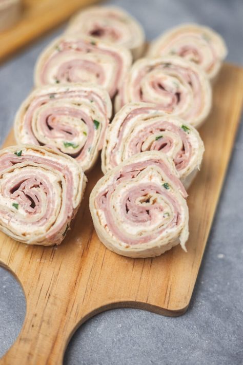 Ham and Cream Cheese Roll Ups With Tortilla - cravingsmallbites.com Tortilla Sandwich Roll Ups, Tortilla Roll Up Sandwiches, Ham And Tortilla Roll Ups, Wraps Recipes Cream Cheese, Cream Cheese Rolls Ups Tortilla, Toasty Ham And Cheese Sandwiches Tipsy Housewife, Ham Tortilla Roll Ups Pinwheels, Easy Roll Ups Tortilla, Lunch Meat Roll Ups Cream Cheese