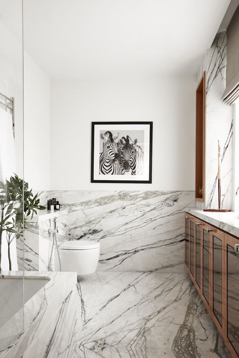 Marble Bathroom with Brown Cabinets and Zebra Art Luxury Penthouse Design, Bathroom With Marble, Marble Walls, Marble Bathroom Designs, White Marble Bathrooms, Marble Bath, Luxury Penthouse, Bad Inspiration, Bathroom Themes