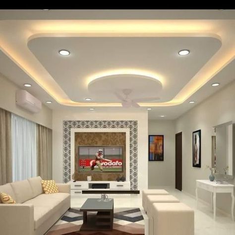 Latest Modern Living Room False Ceiling Design Ideas 2023 | POP False Ceiling Design Is your living room looking a bit dated? Check out these latest Modern Living Room False Ceiling Design Ideas 2023 | POP False Ceiling Design ideas to refresh your space! From bold to subtle, these designs will create a striking impact on your home. Whether you're looking for a dramatic change or something more subtle, these designs will have you looking forward to sitting down in your living room again! Best False Ceiling Designs, Latest False Ceiling Designs, Pop Design For Hall, Simple False Ceiling Design, Gypsum Ceiling Design, Bedroom Pop Design, Simple Ceiling Design, Plafon Gypsum, False Ceiling Bedroom