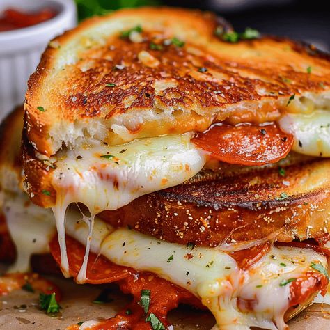 Savor the Ultimate Pizza Grilled Cheese with mozzarella, pepperoni, and a savory butter mixture, perfect for pizza lovers in a sandwich. Pepperoni Grilled Cheese Sandwiches, Vegetarian Pepperoni, Pizza Grilled Cheese Recipes, Savory Butter, Recipe For Pizza, Grill Cheese, Grilled Cheese Recipe, Pizza Grilled Cheese, Simple Family Meals