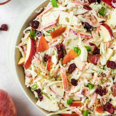 Here is a perfect Apple Cranberry Coleslaw that can take you from summer right into fall and even the holidays!! The salad is loaded with fresh apples, dried cranberries, sunflower seeds, and coleslaw with a tangy dressing of both yogurt and mayonnaise. Perfectly scrumptious for any time, really!! Coleslaw recipes are typically seen with cabbage that has been sliced very thinly. The term slaw can refer to other vegetables that are used to make this type of shredded salad. Apple Coleslaw Recipe, Apple Coleslaw, Easy Coleslaw, Cranberry Apple, Cole Slaw, Weekly Meal Plan, Slaw Recipes, Cabbage Slaw, Coleslaw Recipe