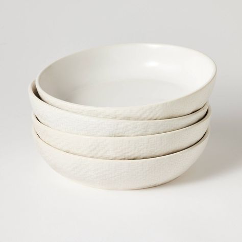 Add a classy finish to your dining setting with the 4-Pack Stoneware Dinner Bowls from Threshold™ designed with Studio McGee. These cream dinner bowls feature a woven-like texture along the exterior for an eye-catching look. Great for everyday dining or hosting guests, these round dinner bowl help provide a perfect base for your soups, salads and more. They can be tossed in the dishwasher for easy cleaning and used in the microwave to heat food. Plus, they boast a scratch-resistant design so you Kitchen Wear, Dinner Bowl, Studio Mcgee Target, Room Organization Bedroom, Beach Tan, Plates And Bowls Set, Art And Craft Materials, Dining Setting, Kitchen Things