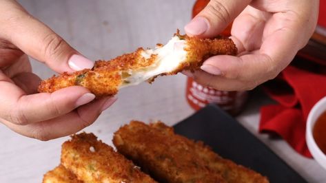 Crab Rangoon Mozzarella Sticks | Better Homes & Gardens Mozzarella Stick, Chinese Appetizers, Crab Rangoon Dip, Food On Sticks, Crab Rangoon, Meat Snacks, Mozzarella Sticks, Cheese Sticks, Vegetable Drinks