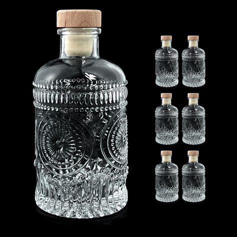 PRICES MAY VARY. Set of 6 glass liquor bottles with T-top caps, measure 5.3"H x x 3.8" Bottom Diameter. Heavy Base: Our 6 oz clear bottles are made of premium glass, heavy base (thicker glass), sturdy and tip-resistant. Tight Seal: set of 6 clear glass bottle with T-top caps ensures good sealing and keeps items fresh tasting for longer. Anti-slip Bottom: The glass wine bottles with embossed lines increase friction so that they are not easy to slip, suitable for any table in your home, bar, cafe, Glass Liquor Bottles, Apothecary Bottles, Cork Stoppers, Sunflower Design, Liquor Bottles, Tea Bottle, Glass Bottle, Glass Bottles, Liquor