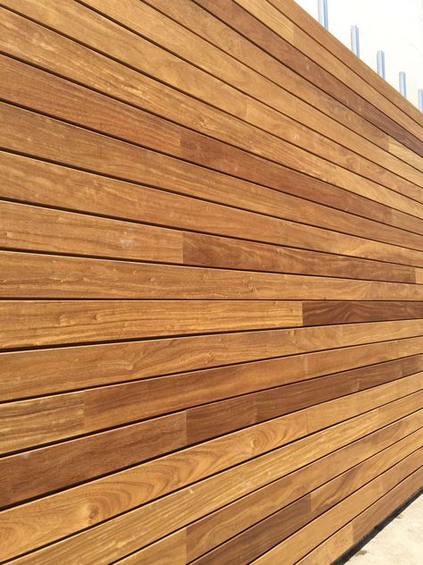 Exterpark Iroko magnet decking & cladding system #decking #cladding #iroko  www.exteriordecking.co.uk Exterior Wood Paneling, Cladding Colours, Wooden Wall Bedroom, Wooden Cladding Exterior, Garden Activity, Wood Cladding Exterior, Wooden Wall Cladding, Modern Siding, Cladding Exterior