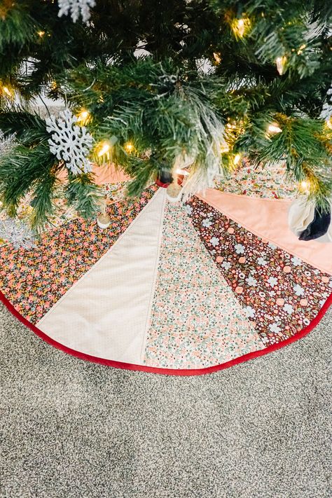 Learn how to make a Christmas tree skirt with an easy sewing pattern. This Christmas sewing project shows off your beautiful holiday fabrics. This simple 12 piece Christmas tree skirt sewing pattern is quick to sew, and it shows off all your stunning holiday fabrics. You can make it from 6 non-directional fat quarters along with batting, backing, and bias binding. I love looking at these beautiful fabrics under my tree! This PDF downloadable pattern comes in only ONE SIZE, finished diameter 44 inches, and only ONE STYLE, 12 piece skirt. Change up the look with different colors and prints. What is included: Color step by step instructions and supply list Printable PDF Sewing Pattern This is a PDF Pattern and not a finished product. You will receive the digital version of the pattern and ins How To Sew A Christmas Tree Skirt, Sewn Tree Skirt, Christmas Sewing Machine Projects, Colorful Christmas Tree Skirt, Scalloped Tree Skirt Pattern, Diy Christmas Tree Skirt No Sew, Sew Christmas Tree Skirt, Diy Sewing Christmas Decorations, Diy Christmas Tree Skirts