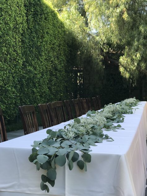 Silver dollar eucalyptus and million star baby’s breath garland set this 32 ft. Long wedding banquet table! Wedding Decor Eucalyptus, Garden Entertaining, Eucalyptus Wedding Decor, Eucalyptus Centerpiece, Wedding Table Garland, Long Table Wedding, Artificial Eucalyptus Garland, Table Garland, Dollar Eucalyptus