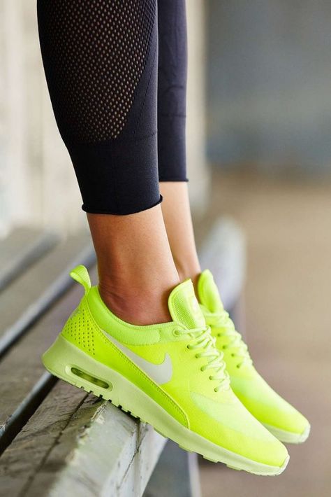 Amp up a pair of boyfriend jeans with these ultra bright lime green sneakers. Neon Nike Shoes, Bright Sneakers, Neon Shoes, Nike Neon, Estilo Fitness, Colorful Sneakers, Nike Sneakers Women, Nike Air Max Thea, Shoes Sneakers Nike