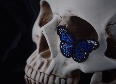 Blue butterfly skull dark aesthetic Blue Butterfly Aesthetic Dark, Blue Monarch Butterfly Aesthetic, Hades Aesthetic Blue, Blue Skull Aesthetic, Dark Blue Red Aesthetic, Dark Blue Butterfly Aesthetic, Blue Spider Aesthetic, Blue Pirate Aesthetic, Dark Butterfly Aesthetic