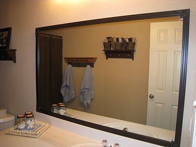 this is what we need!! Cheaper than replacing boring mirrors with framed mirrors. Buy "Mirredge" at Home Depot and just frame the mirror!  YES! Mirror Border Diy, Modern Shower Design, Mirror Frame Diy, Bathroom Mirror Frame, Shanty 2 Chic, Mirror Makeover, Deco Bathroom, Home Decor Bathroom, Home Fix