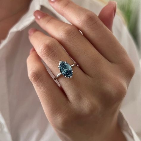 2 Carat Marquise Fancy Vivid Blue Diamond Engagement Ring / Colored Diamond Solitaire Ring / White Gold Marquise Cut Blue Diamond Ring #marquiseengagementring #marquisediamond #marquisdiamond Marquise Sapphire Ring, Marquise Solitaire Engagement Ring, Marquise Rings, Fancy Engagement Rings, Engagement Rings Blue, Blue Diamond Engagement Ring, Engagement Ring Blue, Ring Cuts, Blue Engagement Ring