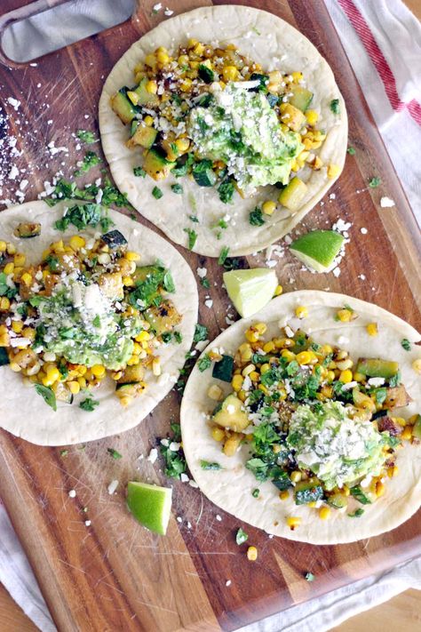 These zucchini and corn tacos with fresh guacamole are simple and healthy, have a bit of a kick, and take only ten minutes to make! Corn Tacos, Healthy Apps, Corn Taco, Party Bites, Farmers Market Recipes, Fresh Guacamole, Csa Recipes, Vegetarian Tacos, Vegan Zucchini