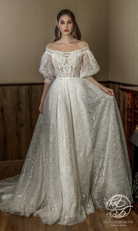 Weddinginspirasi.com featuring - Oleg Baburow “Life is a Miracle” 2021 Wedding Dresses -- oleg baburow 2021 life miracle bridal elbow length puff sleeves off shoulder neckline fully embellished a line ball gown wedding dress chapel train (ornella) mv #Ad #Bridal #OlegBaburow #Sposa #Wedding #Weddingdress #WeddingDresses #WeddingGown #WeddingGowns ~ Oleg Baburow, Dress Pengantin, A Line Ball Gown, Ethereal Wedding Dress, Wedding Dress Gallery, Lace Blouses, Off Shoulder Wedding Dress, Sewing Wedding Dress, Off Shoulder Neckline