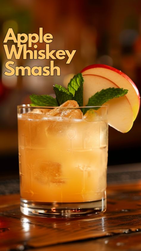 Taste the crisp flavors of fall with our Apple Whiskey Smash recipe. Tart apples and smooth whiskey come together in this easy-to-make cocktail. via @mybartender Caramel Apple Whiskey Cocktail, Fall Bourbon Smash, Irish Whiskey Recipes, Apple Whisky Cocktails, Butterscotch Whiskey Drinks, Elijah Craig Cocktails, Apple Liqueur Cocktails, Brown Liquor Cocktails, Warm Whiskey Cocktails