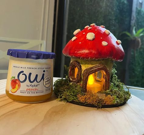 How to Recycle Oui Yogurt Jars — Create a Mushroom Fairy House! | by The Majestic Loot | Medium Polymer Clay Fairy House Diy, Diy Clay Fairy Garden Accessories, Air Dry Clay Mushroom Jar, Air Dry Clay Stash Jar, Air Dry Clay Jar Ideas, Oui Jars Repurpose, Clay Mushroom Jar, Tiny Jar Crafts, Oui Yogurt Jars Ideas