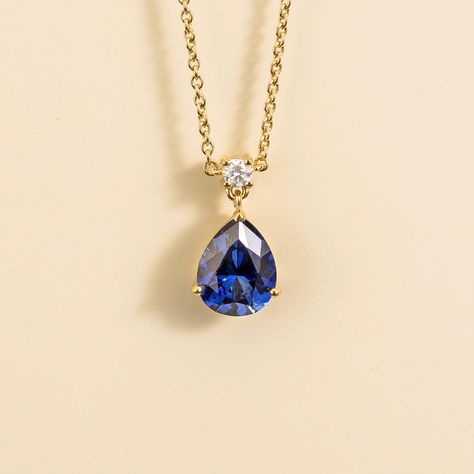 Ori necklace in 18K gold vermeil set with ~2. 20 carats (9mm x 7mm pear) Blue sapphire and ~0. 06 carats Diamond. Mesmerizing simplicity that never goes unnoticed. Pendant dimensions: 12. 8mm height x 7. 7mm width x 4. 9mm depth Length: adjustable 16-18 inches chain Options available to make the necklace in 9K, 14K and 18K gold, and additional sizes, please contact Juvetti. See matching Ori earrings Our precious jewellery is designed to preserve its original brilliance over time. There are a few Gold Jewelry Sets, Drop Pendant Necklace, Blue Sapphire Diamond, Sapphire Pendant, Pear Diamond, Evil Eye Jewelry, Diamond Set, Mens Jewelry Bracelet, Fine Jewelry Gift