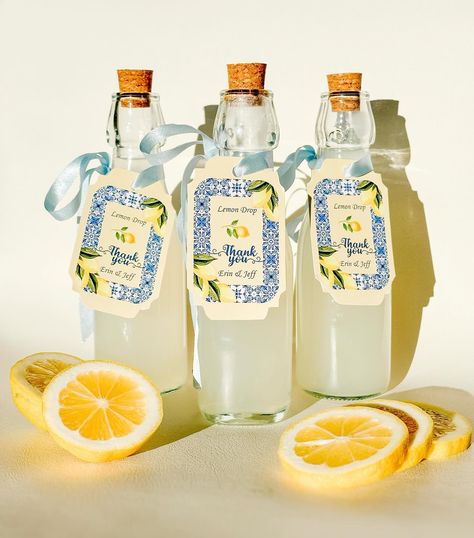 She Found Her Main Squeeze 🍋 Party Favours 🍋 Lemon Drop 2 Ounces Vanilla- Infused vodka 1 Ounce freshly squeezed lemon juice 🍋 1/2 ounce simple syrup Shake over ice 🧊 Bottles and corks from the dollar store Edit and download tags for free from my site #lemonparty #lemonparty🍋 #shefoundhermainsqueeze #lemonpartydecor #lemonpartyfavors #bridalshower #bridalshowerideas Lemon Drop Theme Party, She Found Her Main Squeeze Bridal Party Favors, She Found Her Main Squeeze Bachelorette Party, Engagement Party Favours, Bridal Shower She Found Her Main Squeeze, Main Squeeze Bachelorette Party, She Found Her Main Squeeze Bridal Party, Main Squeeze Bridal Shower Lemon, Lemon Bachelorette