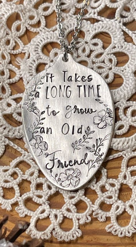 "Hand stamped vintage, sterling silver-plated spoon necklace.  Inscription reads: it takes a long time to grow an old friend No two are exactly alike, as each design is hand stamped, one letter-at-a time.  Includes 28\" stainless steel silver chain." Vintage Silverware Crafts, Stamped Jewelry Ideas, Metal Stamping Ideas, Vintage Spoon Jewelry, Spoon Jewelry Diy, Flatware Crafts, Silver Spoon Jewelry, Cutlery Art, Silverware Crafts