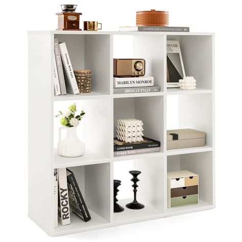 PRICES MAY VARY. [Stylish Storage Solution]: The bookshelf includes a wide top & 9 cubes to maximize the storage & ideally eliminate clutters, while its cubes come in 2 depths (11" & 11.5"). Also, it features a modern & divided design, offering a trendy way to organize your decorations & storage boxes. [Durable & Thick Boards]: Made of thickened boards, Giantex bookcase is built to support a great weight up to 353 lbs, while being durable for a long-term use. More, it resists cracks & comes with Playroom/living Room, Kids Cabinet, Door Dividers, Space Concept, Open Cube, Cube Bookcase, Edge Banding, White Bookcase, Plastic Furniture