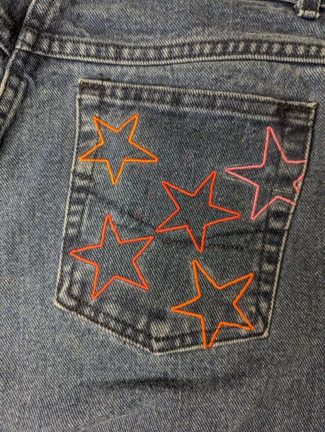 Introducing the original Rainbow Star Jeans by Sensible Slacks! These vintage high rise Chic jeans are reworked with embroidered rainbow stars across the back pockets. Star Embroidered Jeans, Jeans Back Pocket Design Stitching, Beads On Jeans, Sewing Designs On Clothes, Jeans Back Pocket Embroidery, Embroidered Jeans Aesthetic, Shirt Stitching Ideas, Upcycling Jeans Ideas, Upcycling Clothes Aesthetic