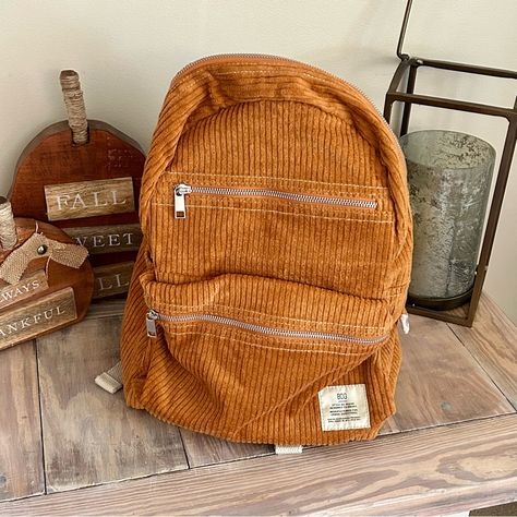 Bdg Corduroy Backpack In Rust - New Brand New With Tags. An Essential Backpack From Bdg In Soft Corduroy. 2 Outer Zip Pockets One Main Pocket Side Slip Pocket For Water Bottle Adjustable Straps 100% Cotton Dimensions: 10.3”L X 6.3”W X 16”H Msrp: $49 Corduroy Backpack, Butterfly Backpack, Brown Backpacks, Backpack Travel Bag, Canvas Backpack, Mini Purse, Orange Brown, Mini Backpack, Brown Orange