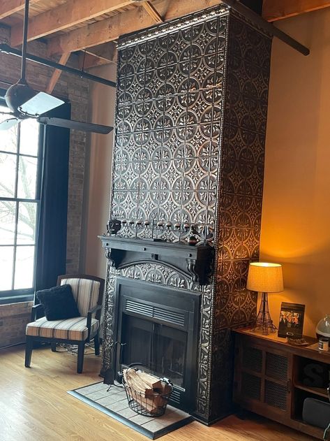 Fireplace Cover Tile, Faux Tin Ceiling Wallpaper, Tiled Wall Fireplace, Tin Tiles Fireplace, Tin Wall Behind Wood Stove, Fireplace Cover Up Tile, Home Fireplace Tile, Tin Ceiling Tiles On Wall, Tin Tile Fireplace Surround