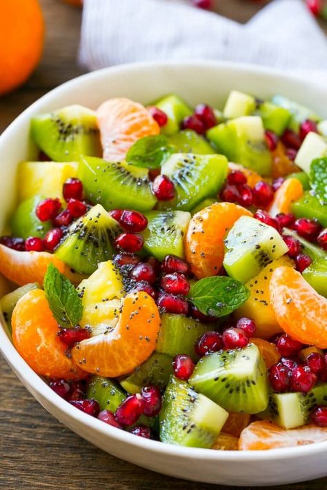 This winter fruit salad is a colorful variety of fresh fruit tossed in a light honey poppy seed dressing. Winter Fruit Salad, Resep Salad, Winter Fruit, Idee Pasto, Fruit Dishes, Fruit Salad Recipes, Läcker Mat, حلويات صحية, Idee Pasto Sano