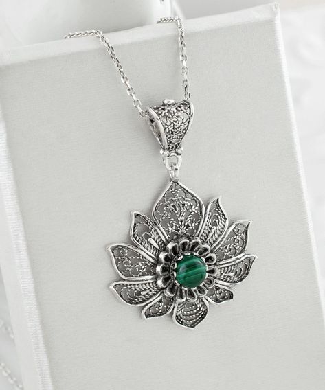 ✨ Unveil the elegance of rebirth with every wear! Our intricately crafted 925 Sterling Silver Filigree Art Malachite Gemstone Lily Flower Pendant is more than just a necklace; it's a symbol of renewal and beauty that complements your every moment. Handmade with love by FiligranUSA, it's the charm that transforms outfits and outlooks. 🌸 Ready to own a masterpiece of jewelry artistry? Click the link for a closer look or to make it yours! 💚 🔗 https://nuel.ink/ZRLpYB #SterlingSilverElegance #H... Lotus Flower Pendant, Blue Topaz Pendant Necklace, Flower Women, Malachite Pendant, Amethyst Necklace Pendant, Oyster Bay, Blue Topaz Pendant, Women Pendant, Aqua Chalcedony