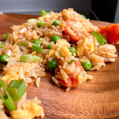 This recipe captures the essence of Panda Express's legendary fried rice, allowing you to recreate the magic anytime you crave it. Simple, satisfying, and bursting with authentic flavors, our copycat version promises to elevate your home-cooked Asian cuisine experience. We love this Copycat Panda Express Fried Rice recipe as a side dish with chicken breasts or as a main dish with a side salad!  Perhaps the best part is how amazing it reheats for leftovers on the busy weekday nights! Side Dish With Chicken, Panda Express Fried Rice, Copycat Panda Express, Panda Express, Fried Rice Recipe, Cooking Instructions, Rice Recipe, Side Salad, Rice Recipes